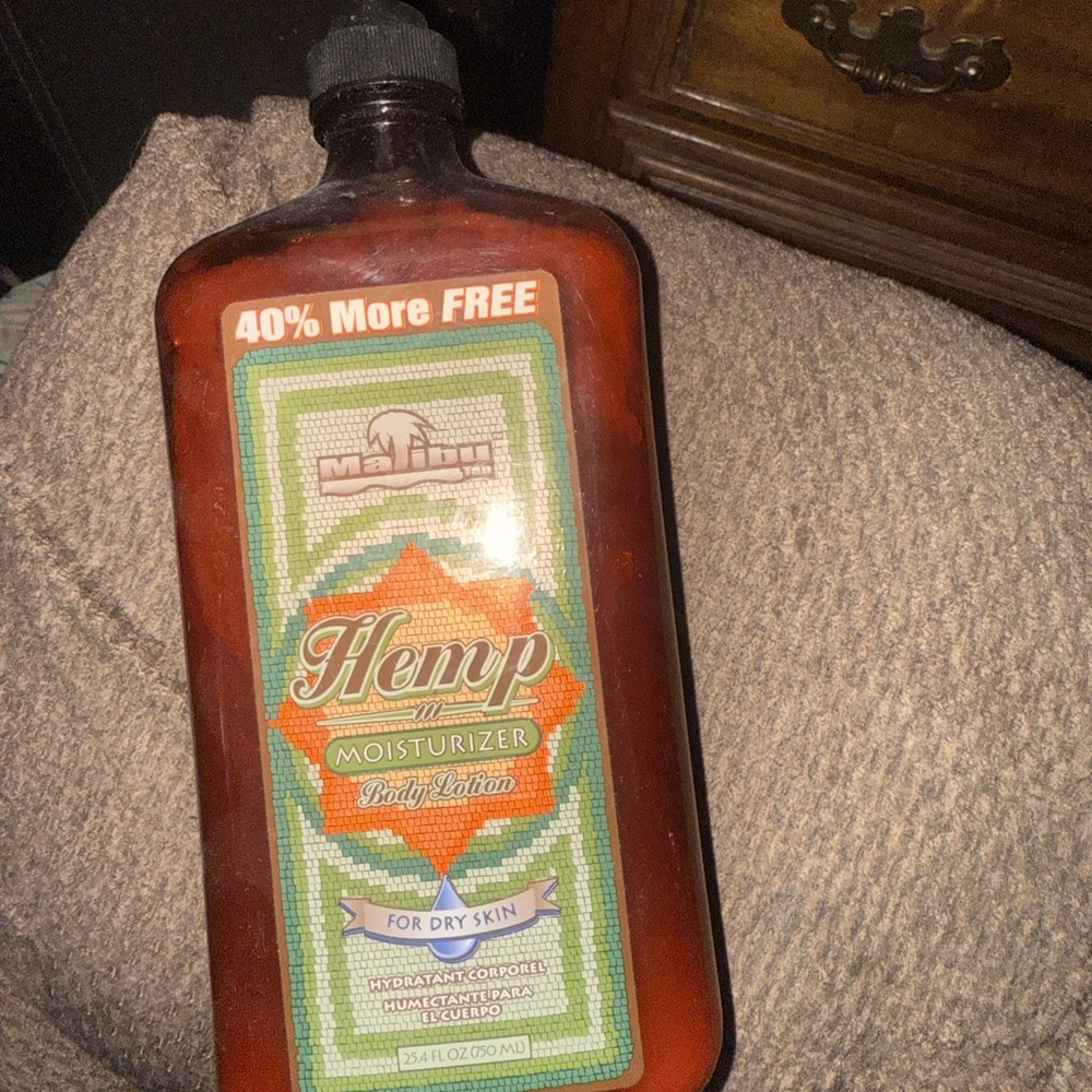 Hemp Moisturizer Body Lotion with Orange and Green Label